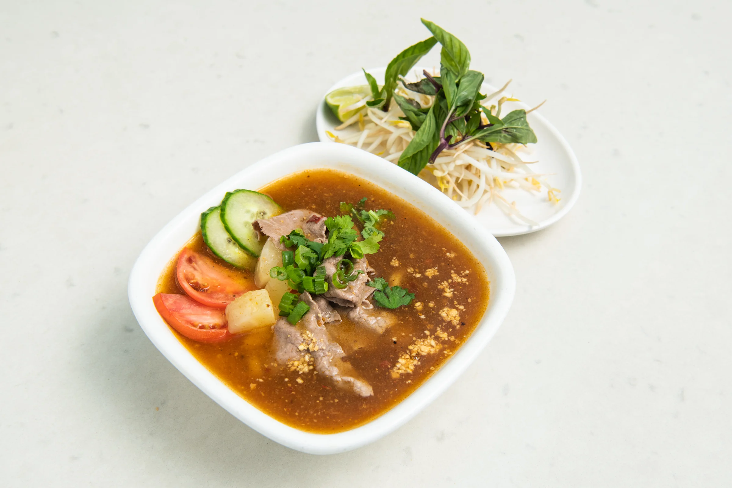 Pho Xe Lua rare beef satay pho